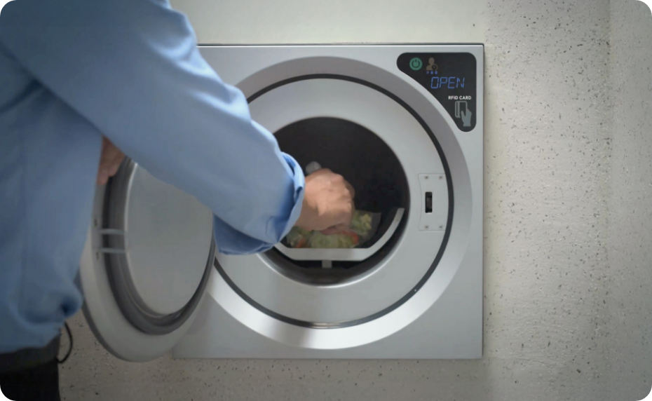 Resident using the waste collection system
